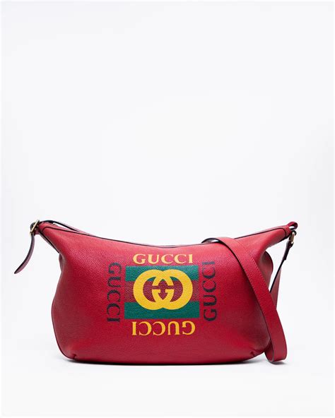 gucci print half-moon hobo bag|gucci monogram duffle bag.